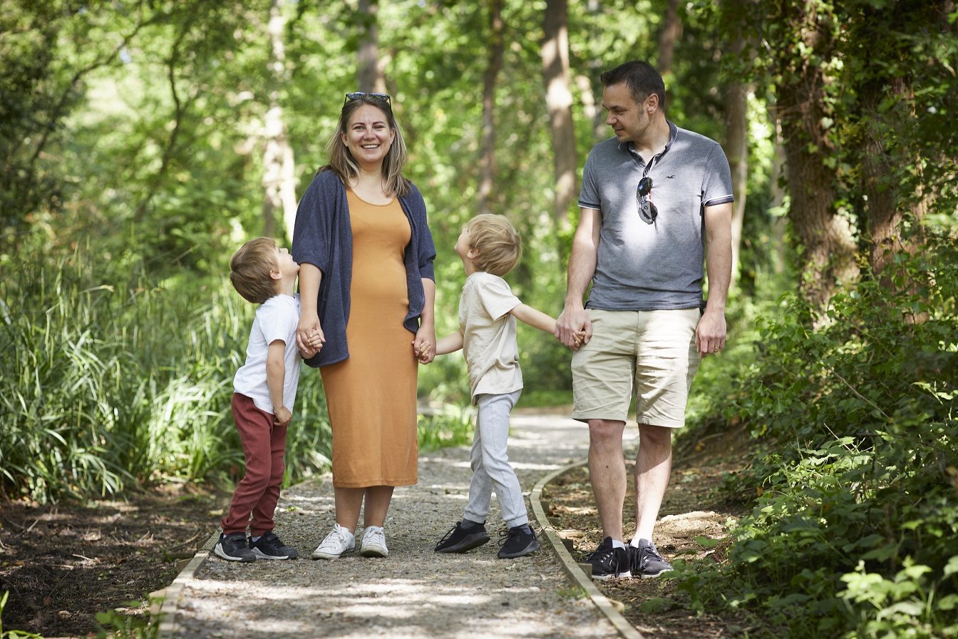 Alex with her husband and two boys